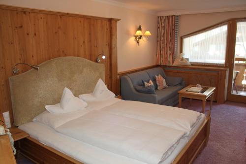 Postel nebo postele na pokoji v ubytování Wellnessresidenz Schalber