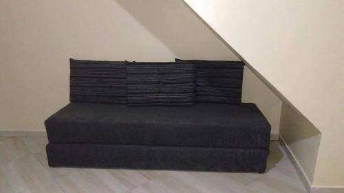 Khu vực ghế ngồi tại Kitnet Central - Arraial do Cabo