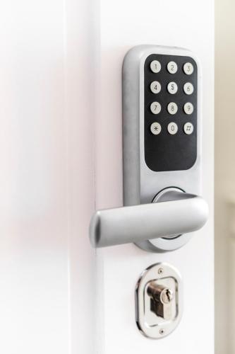 a door handle with a remote control on it at Castle Inn Lisbon Apartments in Lisbon