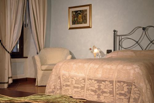 Ένα ή περισσότερα κρεβάτια σε δωμάτιο στο Agriturismo Macesina