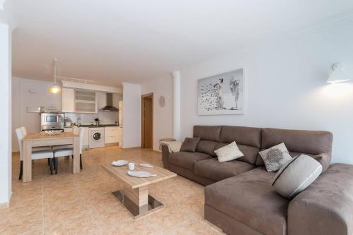 a living room with a couch and a table at Chez Vous in Lorca