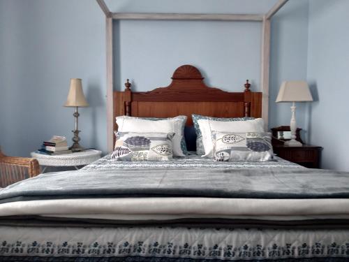 En eller flere senge i et værelse på Casa da American Cable Company