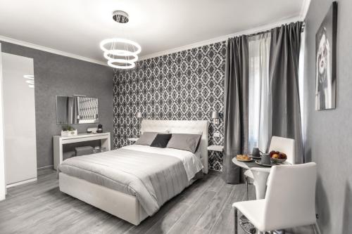 Postel nebo postele na pokoji v ubytování B&B Notti d'Oriente
