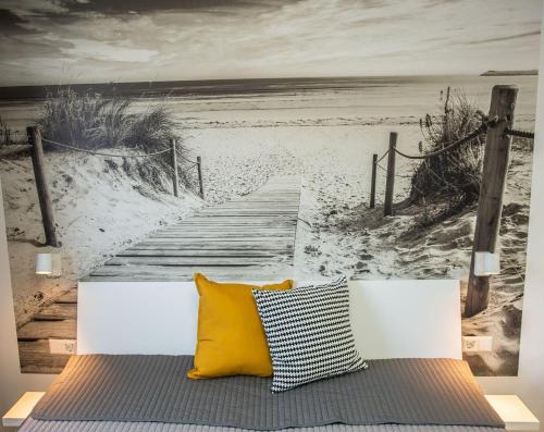 a boardwalk to the beach peel and stick wall mural at Home in Dahme