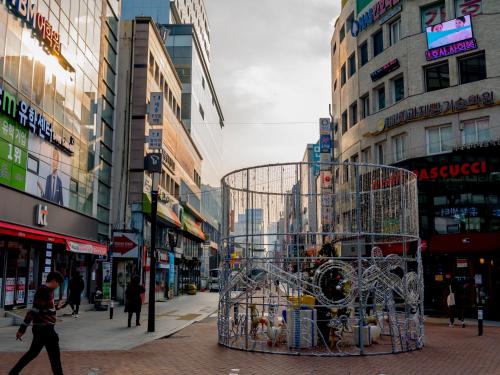 a metal container on a city street with buildings at Toyoko Inn Daegu Dongseongro in Daegu