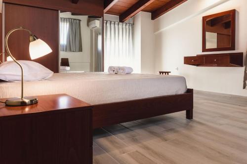 Un pat sau paturi într-o cameră la Villa Irina