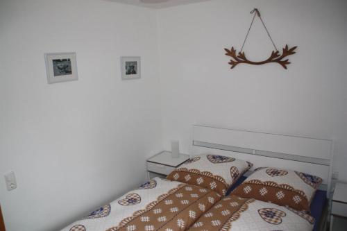 Postel nebo postele na pokoji v ubytování Ferienwohnung Gipfelstürmer