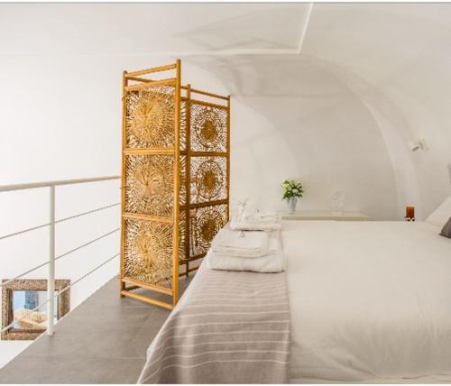 Posteľ alebo postele v izbe v ubytovaní CosyHomeSuite Napoli