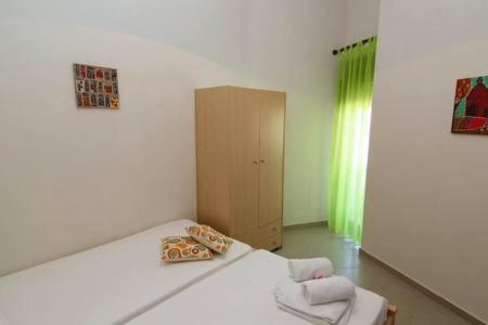 Posteľ alebo postele v izbe v ubytovaní Golden Blue Villa