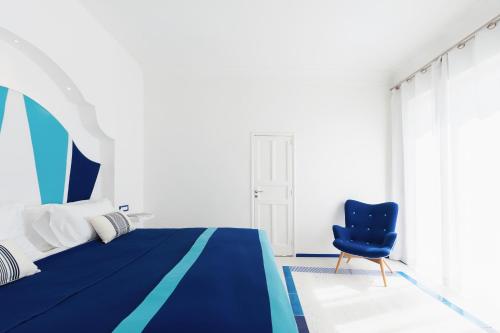 Postel nebo postele na pokoji v ubytování Boutique Suites in Piazzetta
