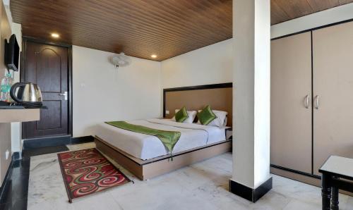 Cama o camas de una habitación en Treebo Mayur, Mall Road