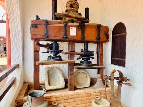 an old fashioned weighing machine in a room at Hotel Villaggio Ristorante Pizzeria Museo TANIT in Carbonia