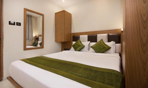 Cama ou camas em um quarto em Hotel Residency Park