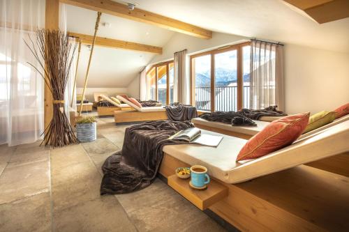 a bedroom with two beds in a room at HELDs Vitalhotel in Ruhpolding