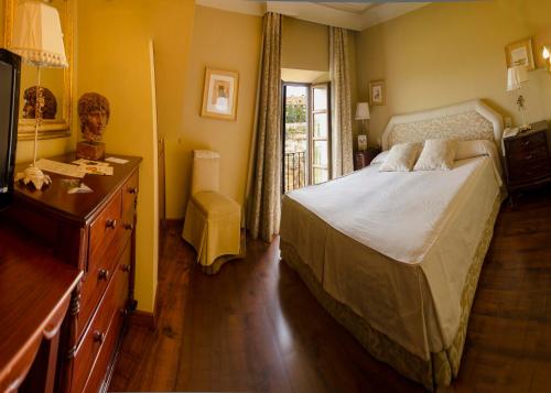 Katil atau katil-katil dalam bilik di Hotel Montelirio