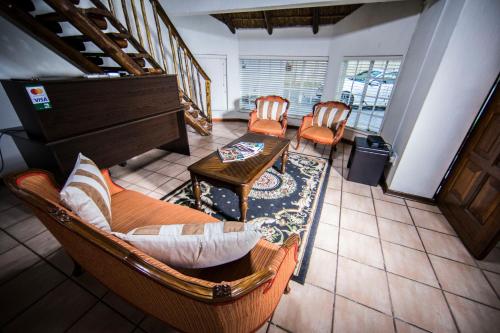 Χώρος καθιστικού στο Kingfisher Lodge