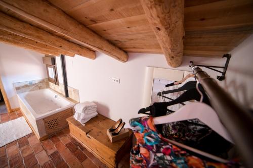 Una cama o camas en una habitación de El Zaguán