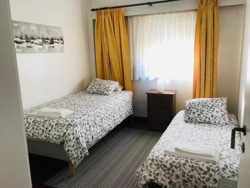Cama ou camas em um quarto em TOISGA Apartment