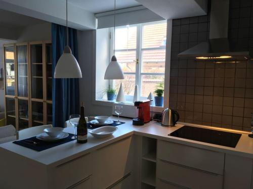 a kitchen with a sink and a counter top with a sink at Haselbachstraße 6 in Ebensfeld