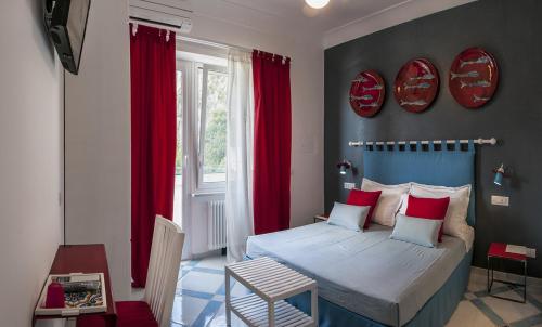 Cama o camas de una habitación en B&B Amalfè