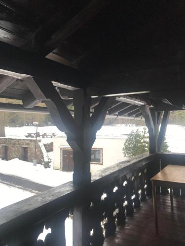 a view from the roof of a building with a table at Apartment Chalet Kladska in Mariánské Lázně