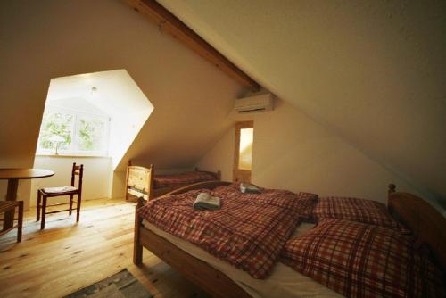 Una cama o camas en una habitación de Gästehaus Liemehna