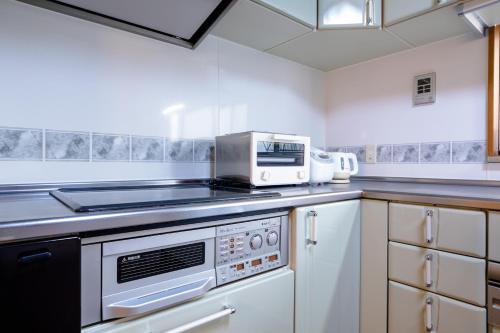 Una cocina o zona de cocina en ID Stay Kawaguchiko