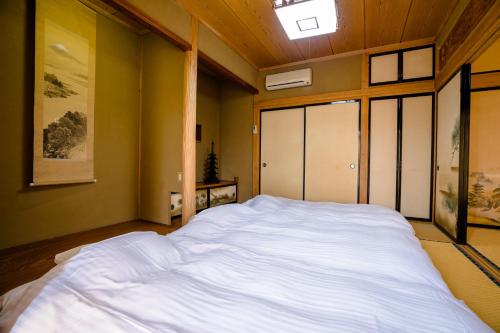 Cama o camas de una habitación en ID Stay Kawaguchiko