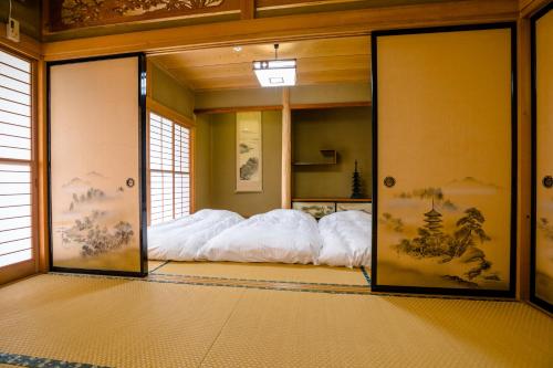Cama o camas de una habitación en ID Stay Kawaguchiko