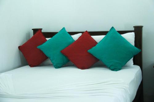 Una cama o camas en una habitación de Ama Villa