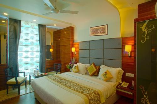 Voodi või voodid majutusasutuse HOTEL DELHI 55 @ NEW DELHI RAILWAY STATION toas