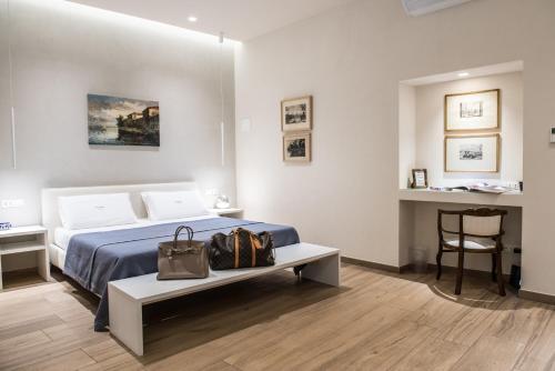 Posteľ alebo postele v izbe v ubytovaní Atto Primo Studio Apartment