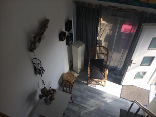 an aerial view of a living room with a window at Loft Zen Climatisé in Soustons