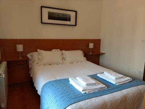 Giường trong phòng chung tại Chalet turístico La Jenduda