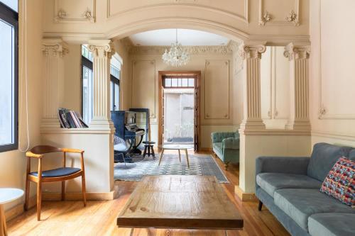 a living room with a couch and a table at 55 Fernández Leal in Mexico City