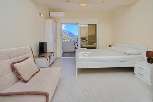 Ένα ή περισσότερα κρεβάτια σε δωμάτιο στο Sea Star Luxury Apartment