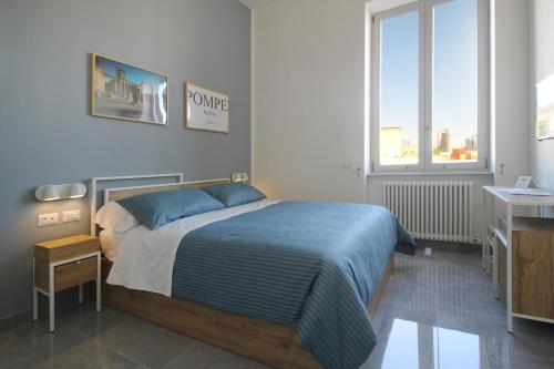 Postel nebo postele na pokoji v ubytování City View Naples