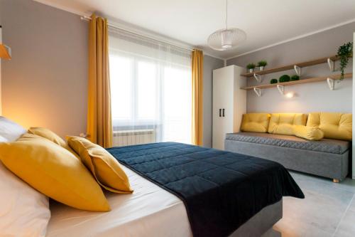 Łóżko lub łóżka w pokoju w obiekcie Apartment Katalea