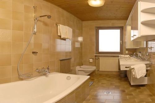 Kylpyhuone majoituspaikassa Residence Bellavista