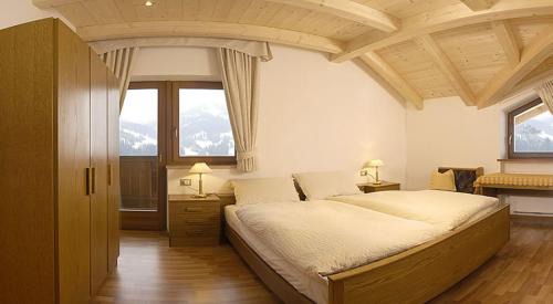 Ein Bett oder Betten in einem Zimmer der Unterkunft Residence Bellavista