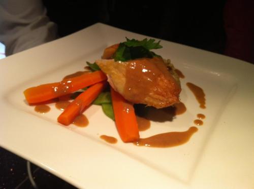 a plate of food with carrots and sauce on it at Hotel Jägerhof in Mayen