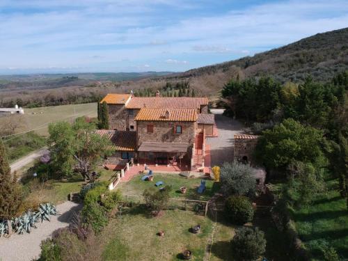 an aerial view of a house in the countryside at Podere Il Tigliolo in Castiglione dʼOrcia