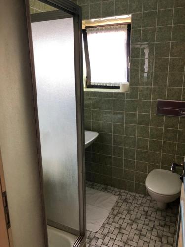 Hotel Pfliegerにあるバスルーム