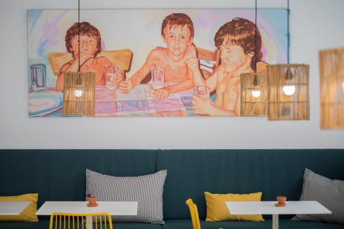 a painting of three people in a bath tub at whala!fun in El Arenal