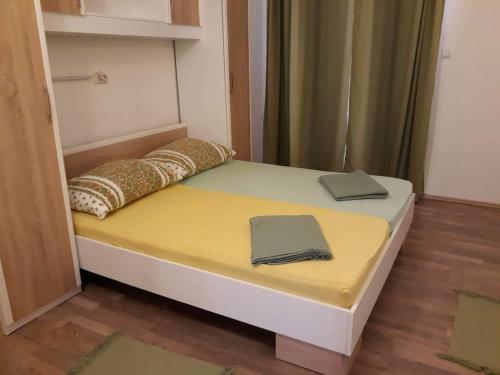 Postel nebo postele na pokoji v ubytování Apartments New Charming
