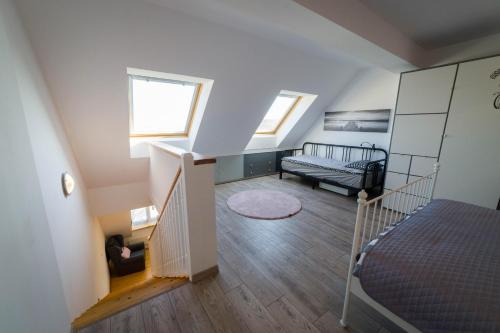 Posteľ alebo postele v izbe v ubytovaní Apartament51