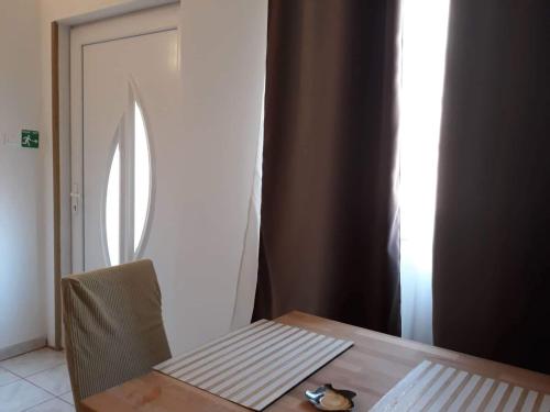 Postel nebo postele na pokoji v ubytování Apartments New Charming