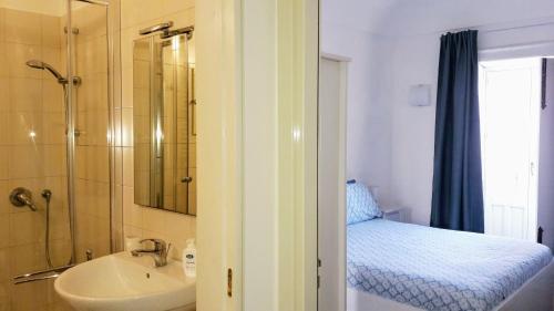 Koupelna v ubytování Elegante appartamento in palazzo storico Ortigia