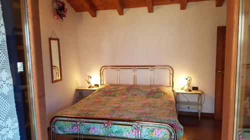 Giường trong phòng chung tại Agriturismo Volpe Golosa