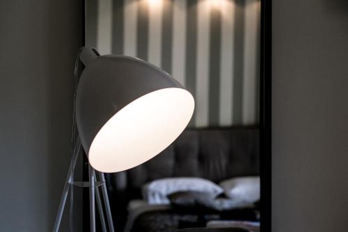 Postel nebo postele na pokoji v ubytování Stamos Hotel